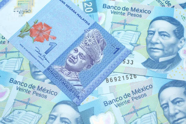 Närbild Blå Malaysisk Ringgit Sedel Säng Med Mexikanska Tjugo Pesos — Stockfoto