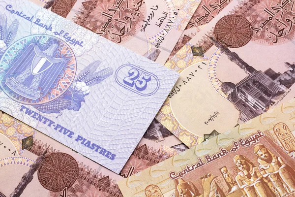 エジプトの25ピアストル紙幣とエジプトの1ポンド紙幣のクローズアップ画像マクロ ロイヤリティフリーのストック画像