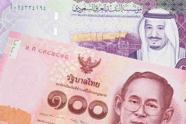 Red One Hundred Thai Baht Five Riyal Note Saudi Arabia — Stock Photo, Image