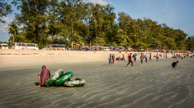 playing people at MaungMaKan beach, Tanintharyi State, southern Myanmar clipart