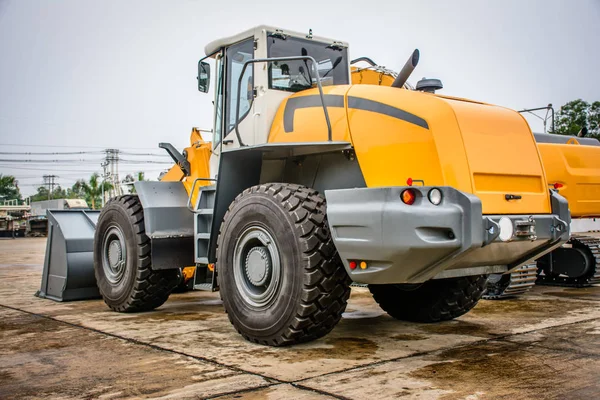 Closeup photo of big wheel loader — Stock Photo, Image