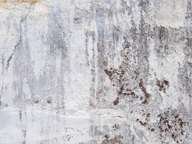 White paint wall uneven rough texture with dark mark and cracked line copyspace background