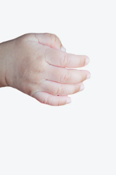 Рука младенца на белом фоне — стоковое фото