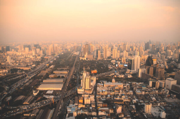 Bird eye view of Bangkok city from tower with blur