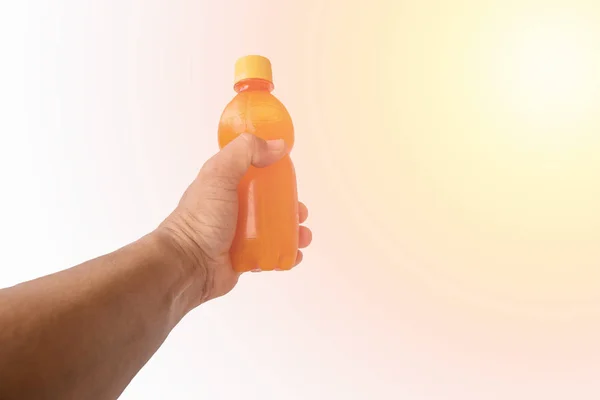 Mão Para Suco Laranja Com Fundo Flare — Fotografia de Stock