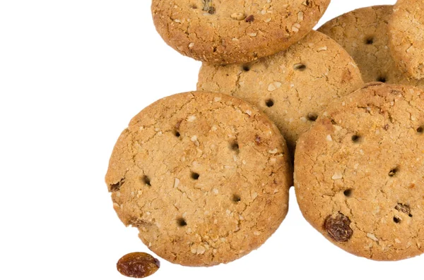 Haferflockenplätzchen mit Rosinen und Mandeln auf der Oberseite isoliert an Pfingsten — Stockfoto