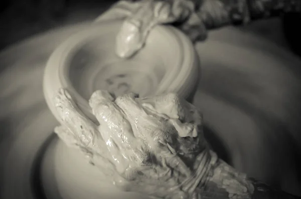 A closeup shot of hands of a potter man making pots — Stock Photo, Image