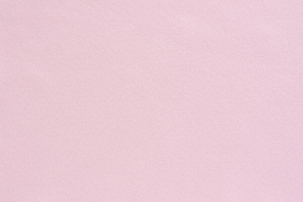 Мягкий спокойный пастельно-розовый фон текстуры ткани войлок
