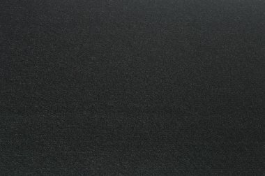 Siyah renkli yüzey hissettim. Arka plan ve tasarım için doku.
