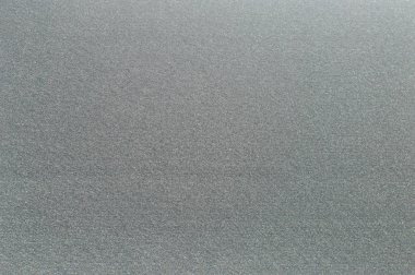 Siyah ve beyaz renklerde yüzey hissettim. Arka plan ve tasarım için doku.