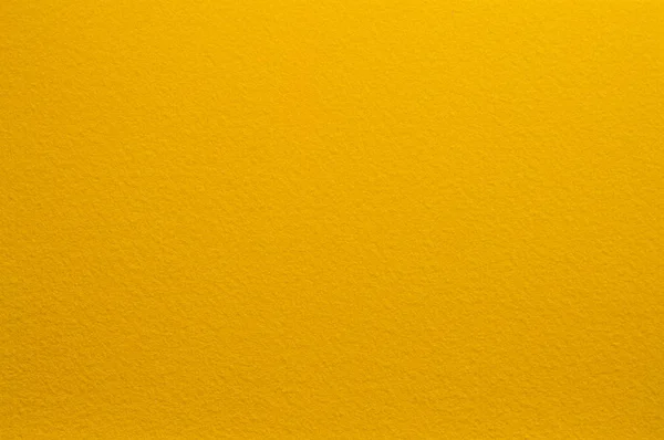 黄色の色で表面を感じた。抽象的な背景とデザインのためのテクスチャ. — ストック写真