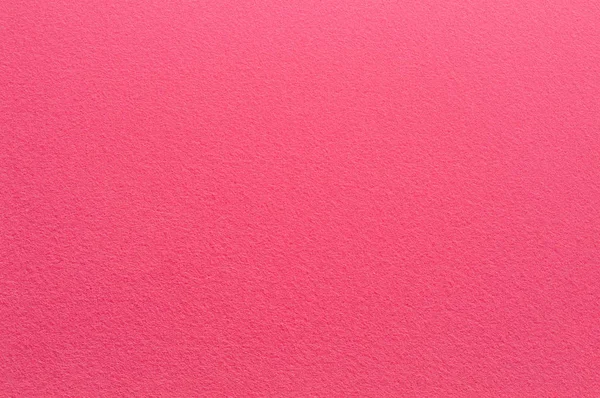 Superficie de fieltro en color rosa claro profundo. Fondo abstracto y textura para el diseño . Fotos de stock libres de derechos