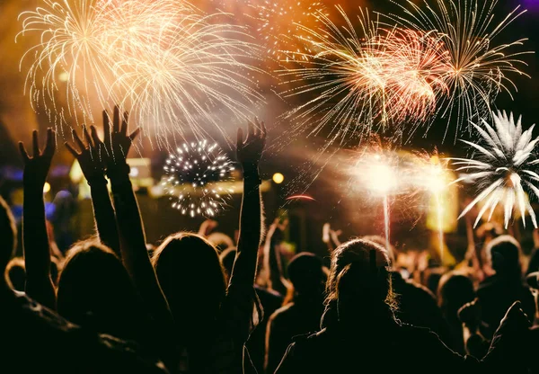 Cheering crowd and fireworks — Stock Photo, Image