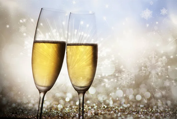 Champagne glasses against holiday lights — Stock Photo, Image