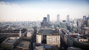rooftop view over London on a foggy day from St Paul's cathedral clipart
