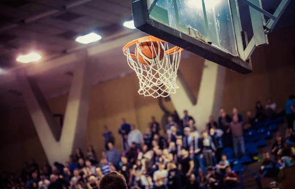 scoring the winning points at a basketball game