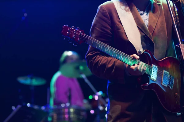 Guitarist on stage - summer music festival — Stock Photo, Image