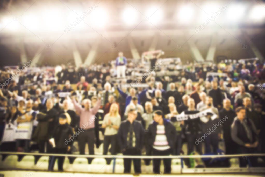 blurred background of crowd of people in a basketball court
