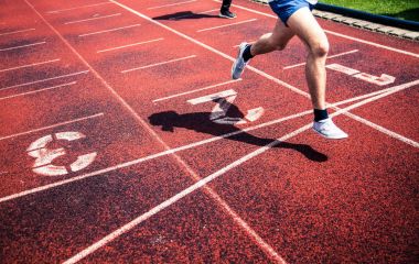 runners approaching the finish line of a race clipart