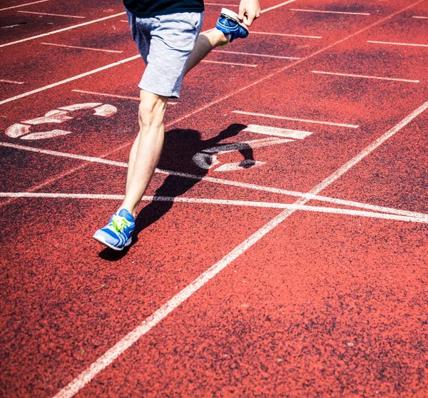 Corredores se aproximando da linha de chegada de uma corrida — Fotografia de Stock