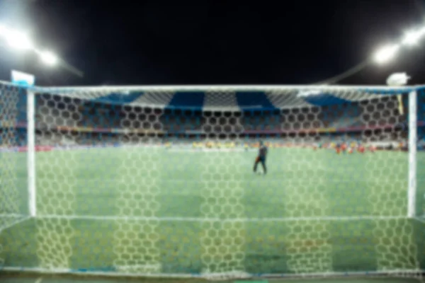 Estadio de la noche arena campo de fútbol desenfocado fondo — Foto de Stock