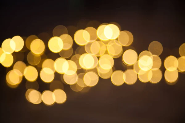 Luces de Navidad sobre fondo de madera — Foto de Stock