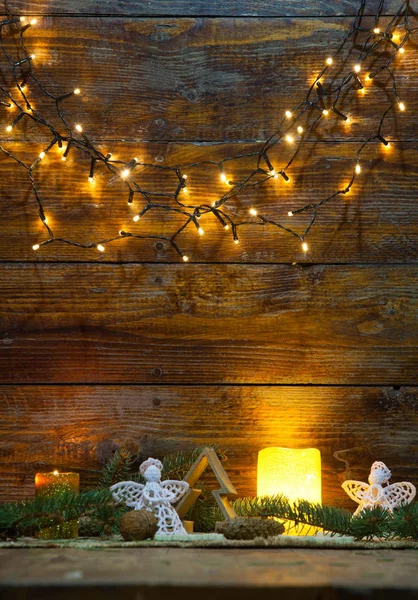 Christmas decorations and lights on wooden background — Stock Photo, Image