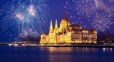 celebrating New Year in the city - Budapest parliament with fire clipart