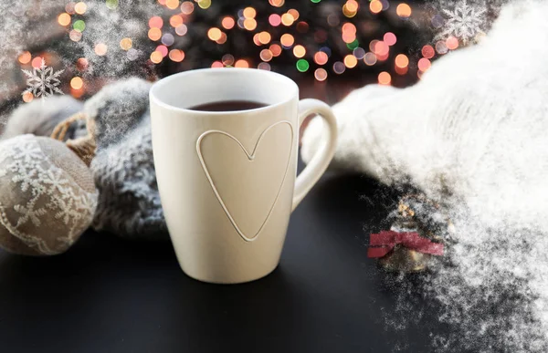 Hot tea in white cup and Christmas decorations - cozy winter day — Stock Photo, Image