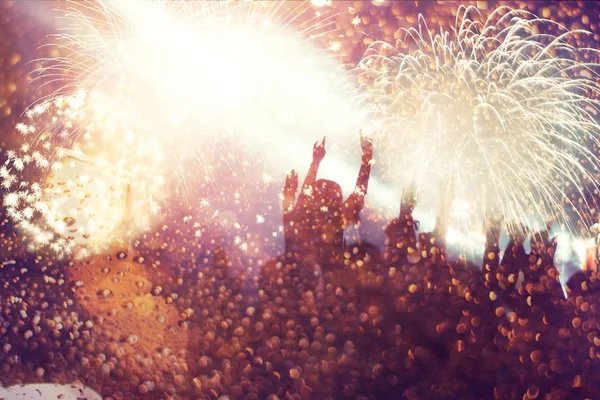 Crowd watching fireworks at New Year — Stock Photo, Image