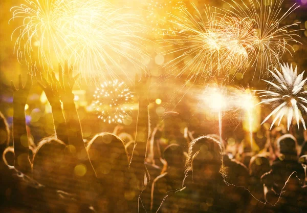 Cheering crowd and fireworks — Stock Photo, Image