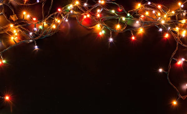 Coloridas luces de Navidad de fondo —  Fotos de Stock