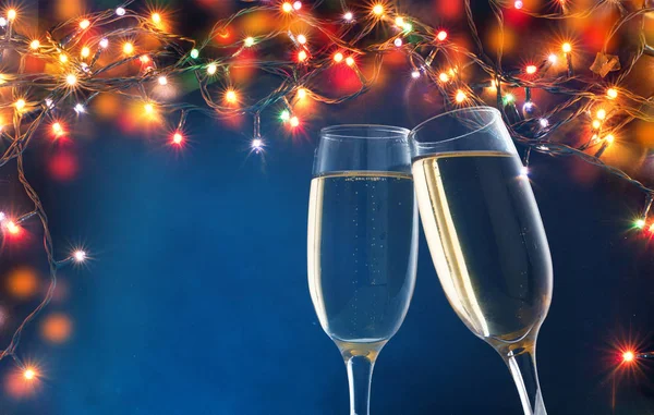 Two champagne glasses ready to bring in the New Year - holiday l — Stock Photo, Image