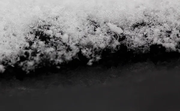 Κλείστε επάνω σε φρέσκο χιόνι - φόντο διακοπές — Φωτογραφία Αρχείου