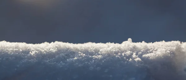 Närbild på nysnö - holiday bakgrund — Stockfoto