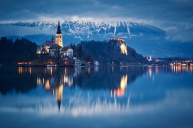 night scenery at Bled lake with church on island . Dramatic , pi clipart