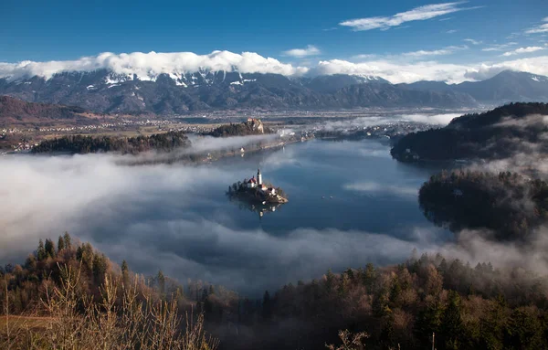 Aerial view over lake Bled on a foggy morning from Ojstrica view — Stock Photo, Image