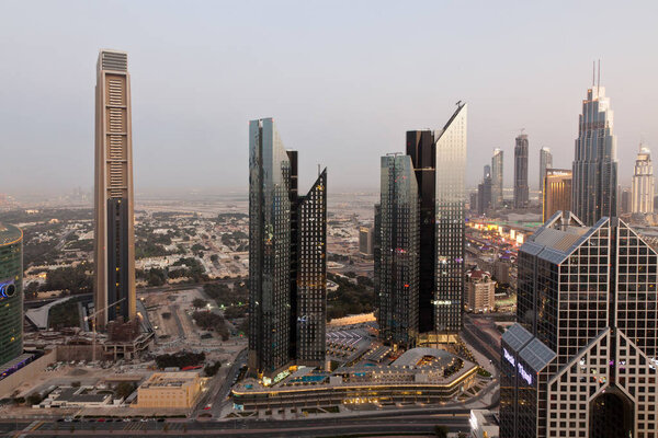 DUBAI, UAE - FEBRUARY 2018: Dubai skyline at sunset with Burj Kh