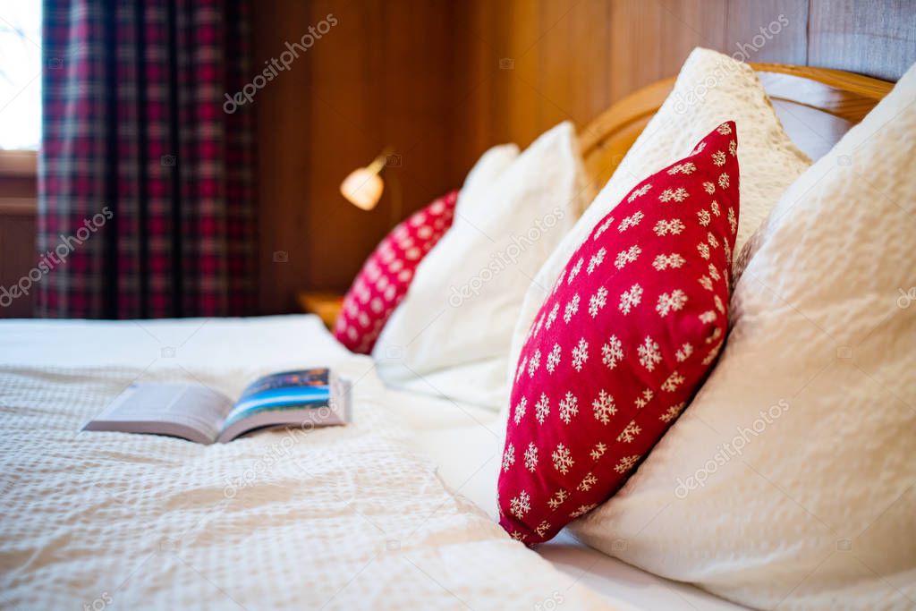 cozy bedroom red pillows hygge