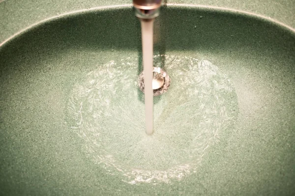 Running tap water in bathroom — Stock Photo, Image