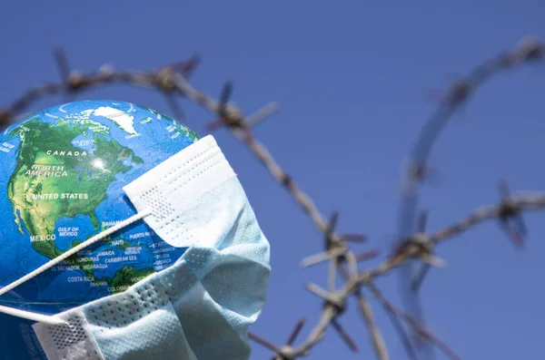 Coronavirus Global Fight Concept Covid Surgical Mask Globe Wired Fence — Stock Photo, Image