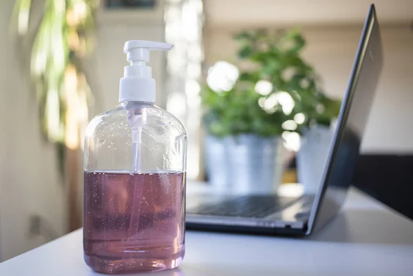 hand sanitizer in home office - coronavirus