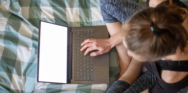 Woman Using Laptop Tablet Bed White Empty Screen Copy Space — Stock Photo, Image