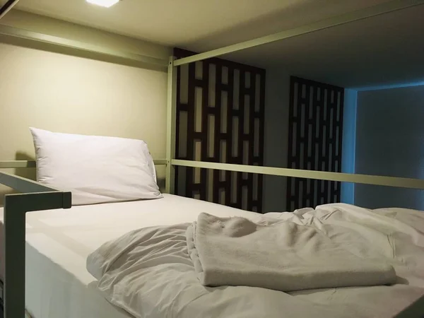 Interior bedroom of upper bunk bed modern design in hostel