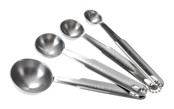 Metal kaşık farklı boyutlarda ölçme kümesi. WH izole