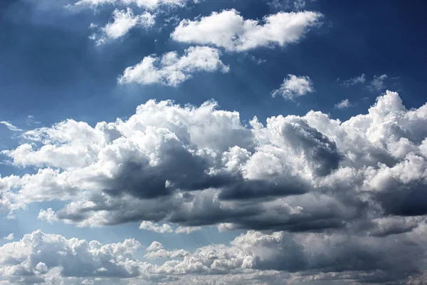 Clouds are a collection of very fine water droplets (fog) or ice crystals in the atmosphere.