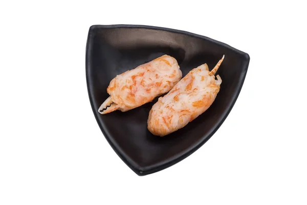 Palitos de cangrejo en plato negro —  Fotos de Stock