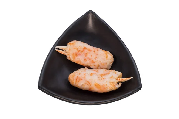 Palitos de cangrejo en plato negro —  Fotos de Stock