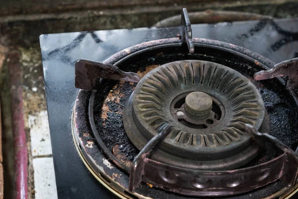 A dirty gas stove close up in a kitchen — Stock Photo, Image