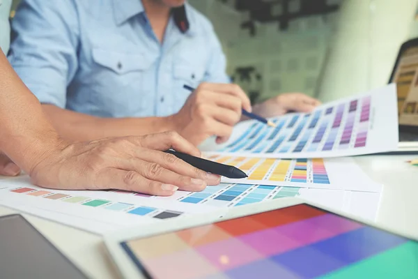 Graphic design and color swatches and pens on a desk. Architectural drawing with work tools and accessories. — Stock Photo, Image